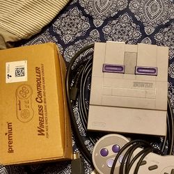 Nintendo" mini" 1 wired controller & two wireless controllers 