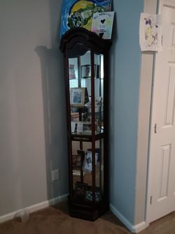 tall corner curio cabinet