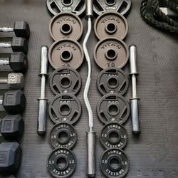 Olympic Weight Plates (2x25Lbs,4x10Lbs,4x5Lbs,4x2.5Lbs) and EZ Curl Bar/(2) Dumbbell Bars with (4) clips for $150 Firm (WALNUT 91789)