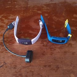 2 Fitbits With 1 Charger