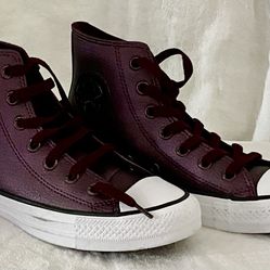 Converse Chuck Taylor ladies  All Star high-top sneakers are in a Burgundy Metallica shade
