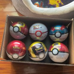 6 Pack Of Poke Ball Tins Comes with 3 Booster Packs Inside & 2 Sticker Packs from Costco 18 Packs Total