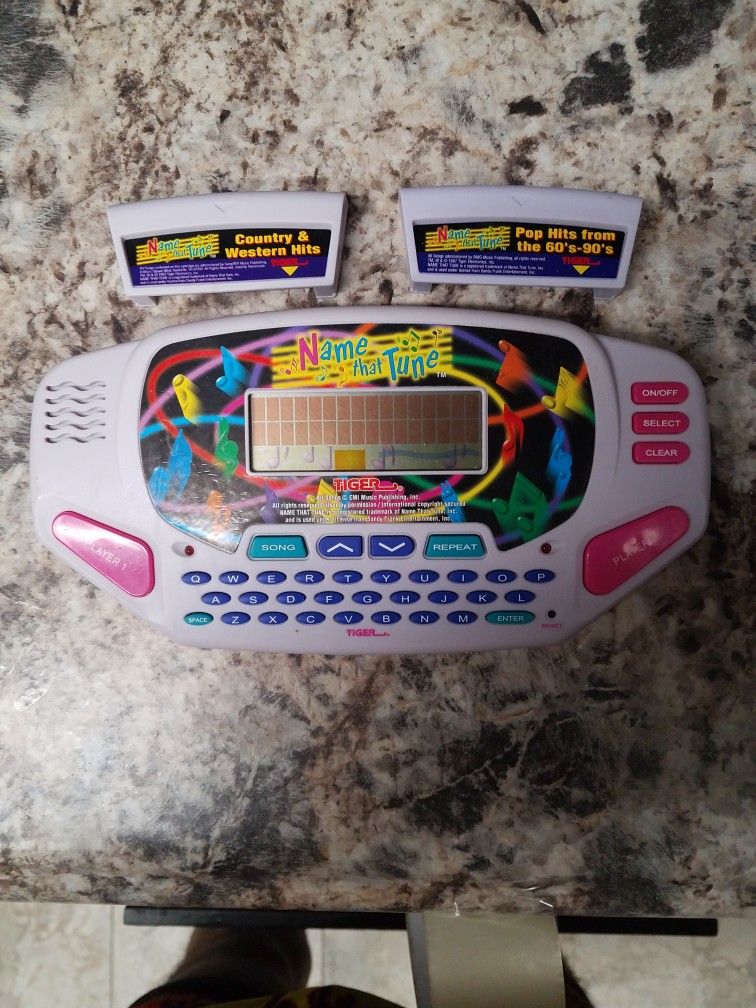 Name That Tune Electronic Handheld Game Includes 2 Game Cartridges