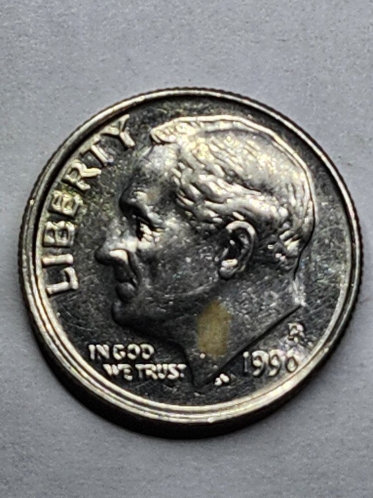 1990 P dime center rim error