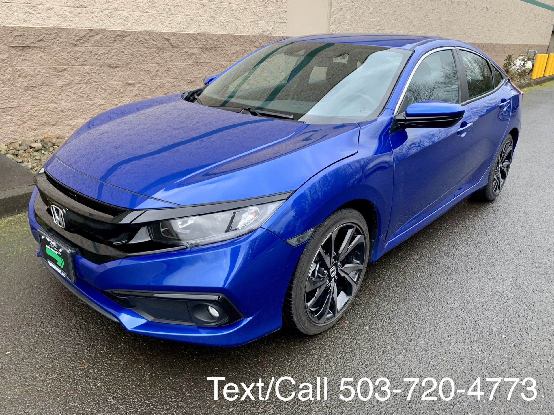 Blue 2019 Honda Civic sport 2000 miles