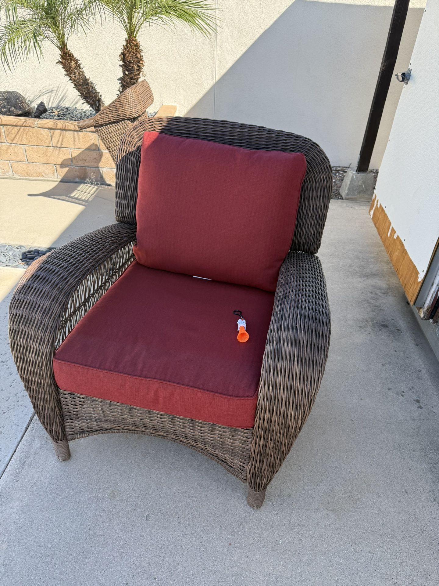 Wicker Chair & Ottoman With red Cushions