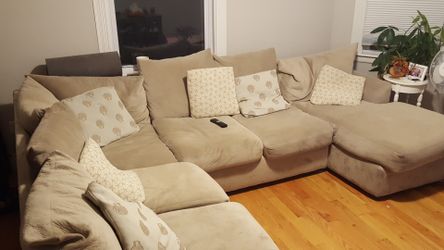 Bernie and Phyl's sand colored sectional