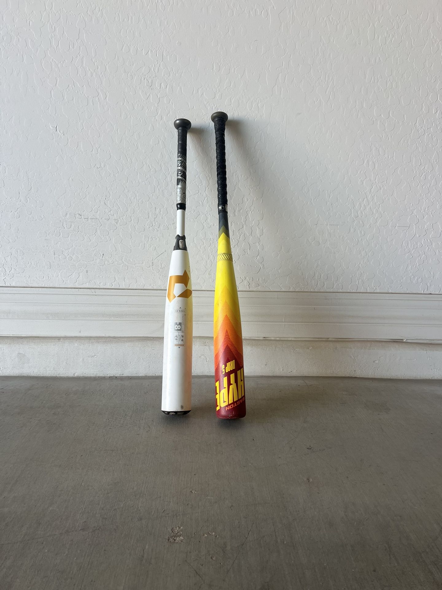 Easton Hype Fire (30 in / 25 oz) and Demarini CF (29 in / 21 oz)