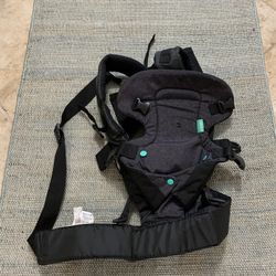 Baby carrier. Tag in picture.