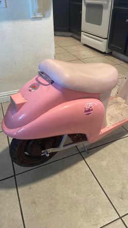 Pink moped razor