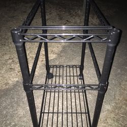 Rollaround bakers rack $25 holds pots and pans to one hanger