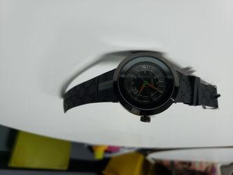 Cartiers/ and Versace watch / and Gucci watch .