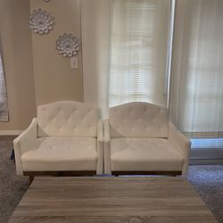 2 White Faux leather Chairs 