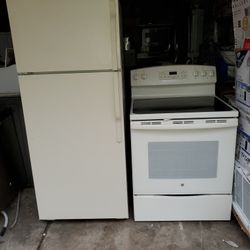 GE sets  stove  baige  fridge  baige great condition 90 days warranty...595 sets  free microwave