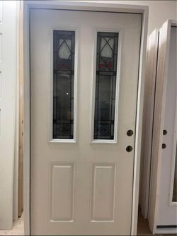 White Entry Door with Decorative Glass