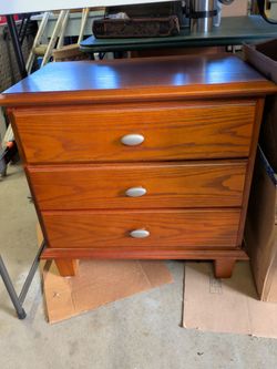 Bedside table, small chest of drawers.