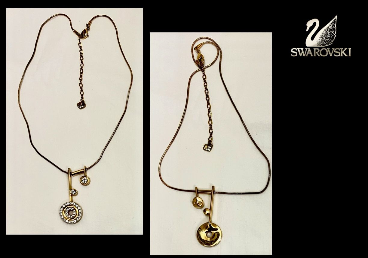 Swarovski rare music note necklace.