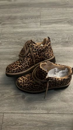corky’s leopard print boots.