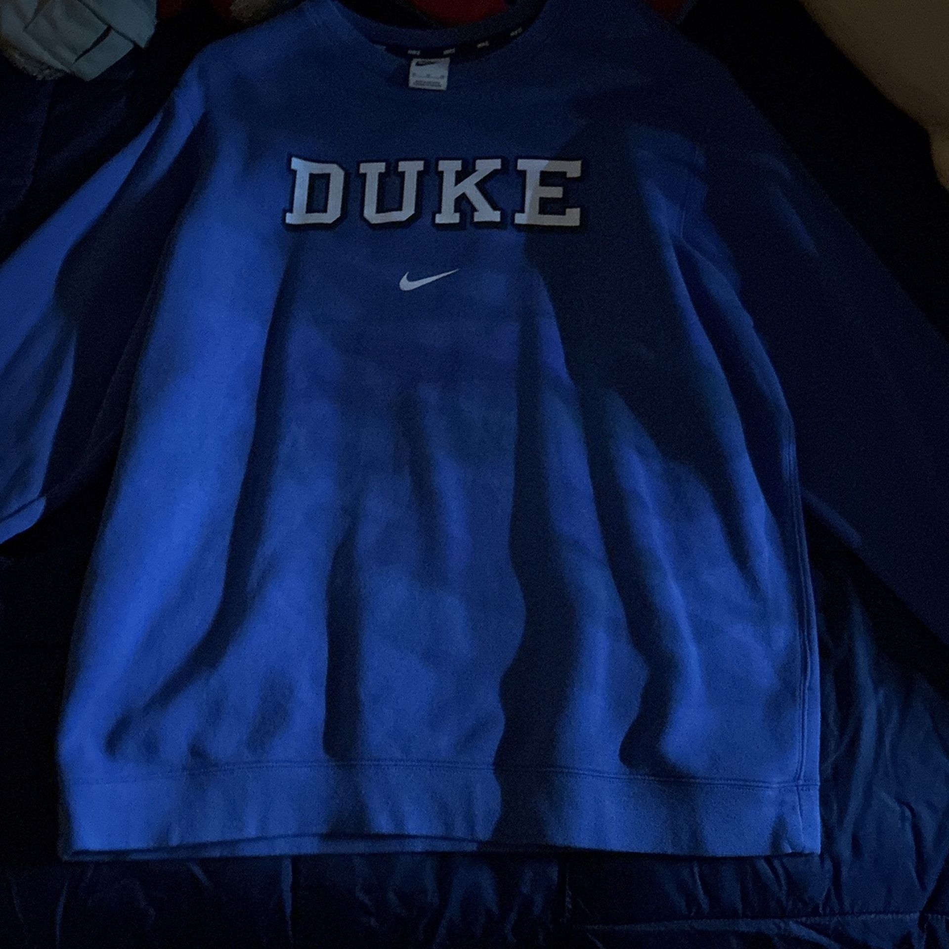 duke nike blue sweater, size medium,condtion:never used