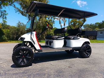 Make offer! Trade or sell! Very clean Lifted 2012 ezgo txt gas golf cart