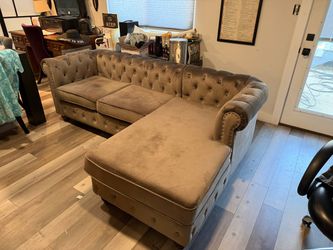 Chesterfield-style couch with chaise
