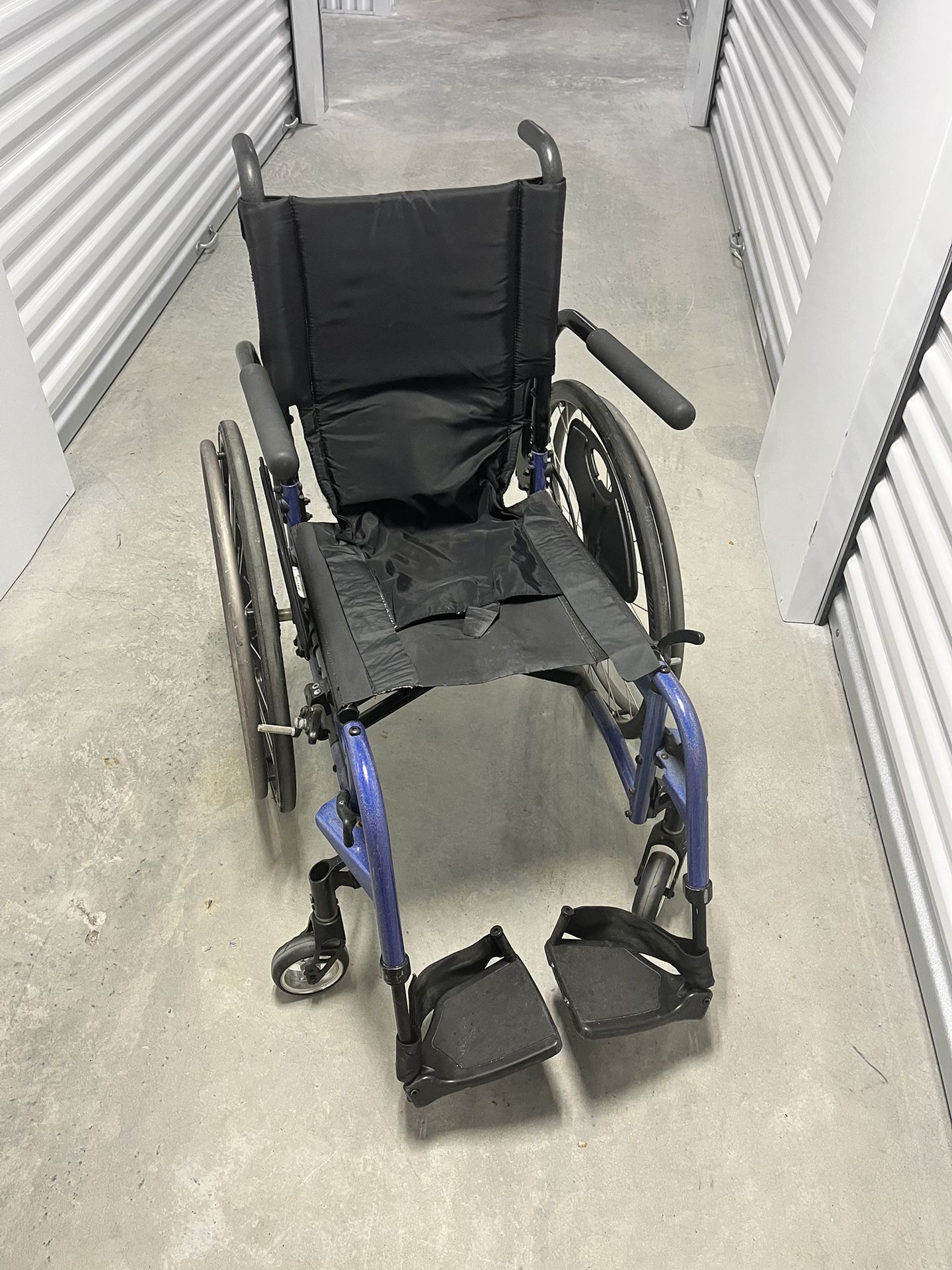 Quicke Brand Titanium Wheel Chair