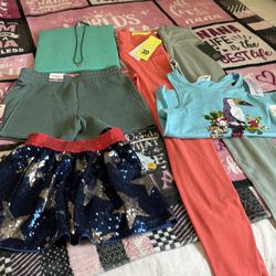 Bundle! Top size M8, leggings size XS, And XXS, skirt color navy stars