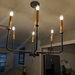 2 different styles of light fixtures Brand New in Boxes ( Price per box)