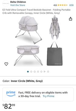 Delta Children Compact Travel Bedside Bassinet 