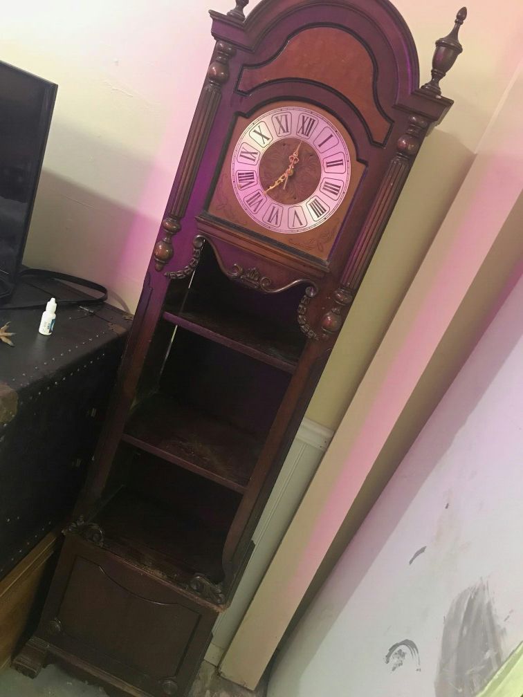 Antique clock with shelves