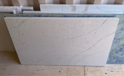 Quartz Countertop 25.5”x42.5” with 1.5 inch manufactured edge on the front and left