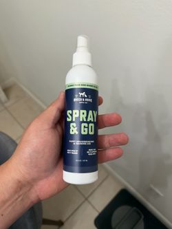 Spray and go dog training aid