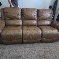 Brown Couch With Dual Relcining Seats