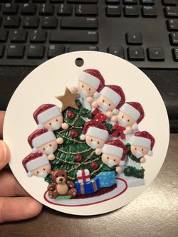 9 person Christmas ornament