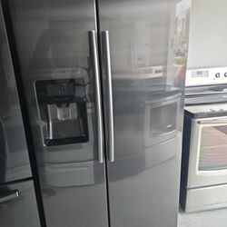 SAMSUNG  SIDE BY SIDE FRIDGE FREEZER