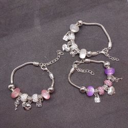 Set Of Charming Charm Bracelets