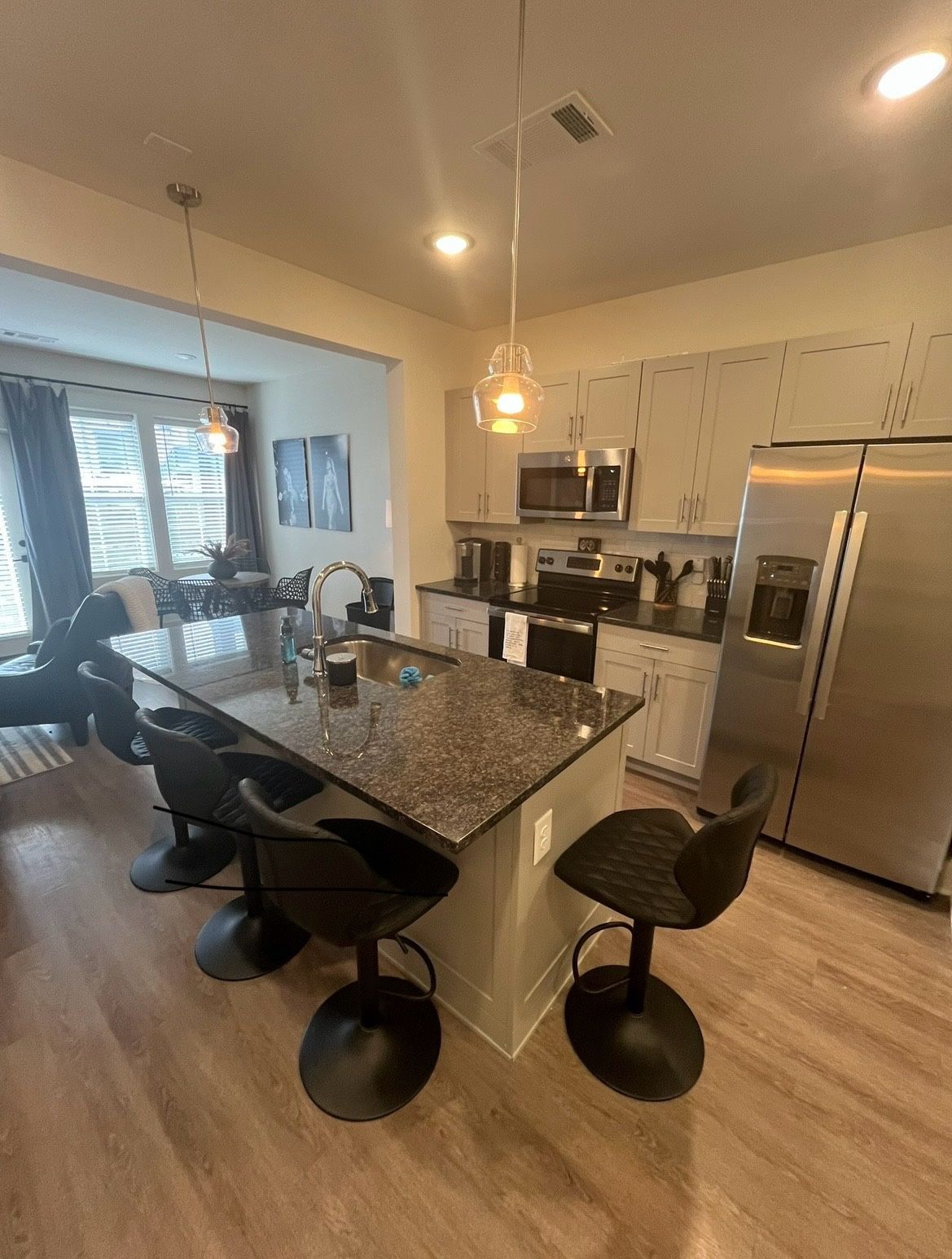 4 Adjustable Barstools 
