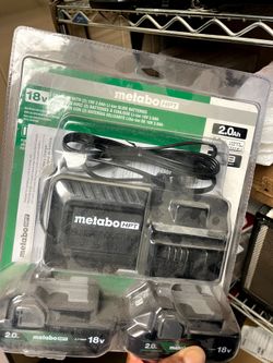 Brand new charger and 2 batteries $80