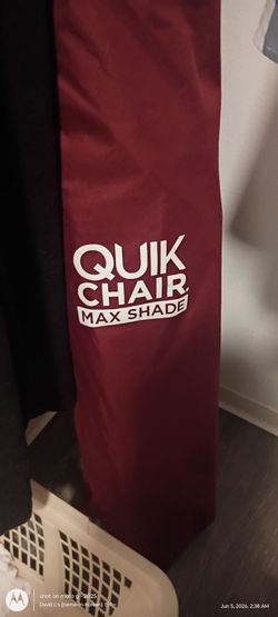 Folding lawn chair with shade attachment