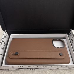 Casetify IPhone 11 Pro Max Leather case with strap to hold comfortably and acts as a phone stand. You can customize with charms (not included)  - NEW 