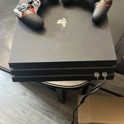 Sony Playstation 4 with Two Controllers Included