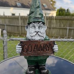 Gnome Holding Go Away Sign