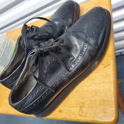 Men's black leather shoes size 11 by Steven Land.