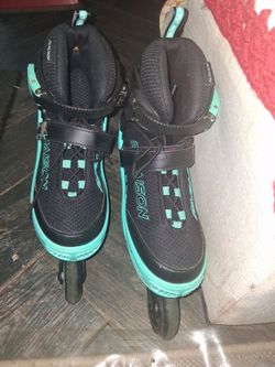 Paison Inline Skates Black and Teal adjustable sizes fits size 7 to eleven