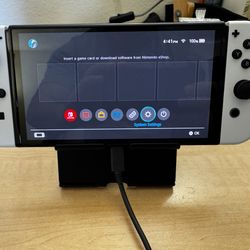Nintendo Switch OLED (with 2 extra JoyCon controllers, 128gb Sandisk SD Card, NO Dock, carrying case, stand, couple of games and Joycon charger)