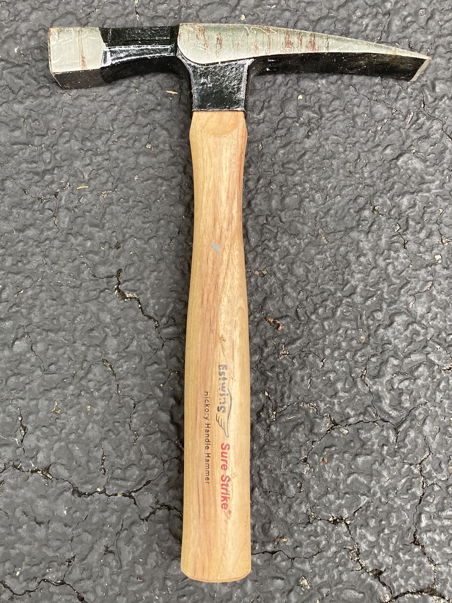Slightly Used Brick Hammer