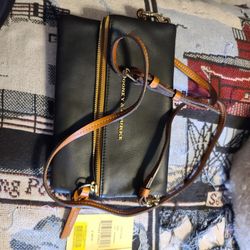 Dooney & Bourke small leather clutch Brand New