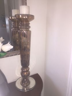 Copper colored glass candle stick