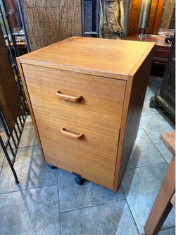 Mid Century  teak wood cabinet this tablet has five wheels