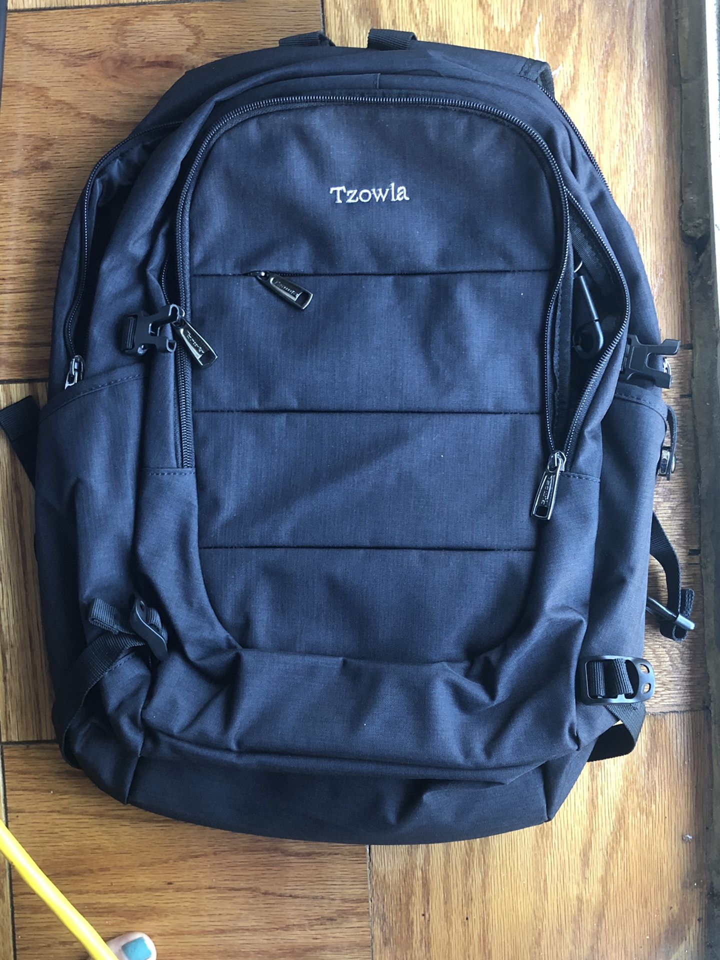 Black backpack with storage and lock